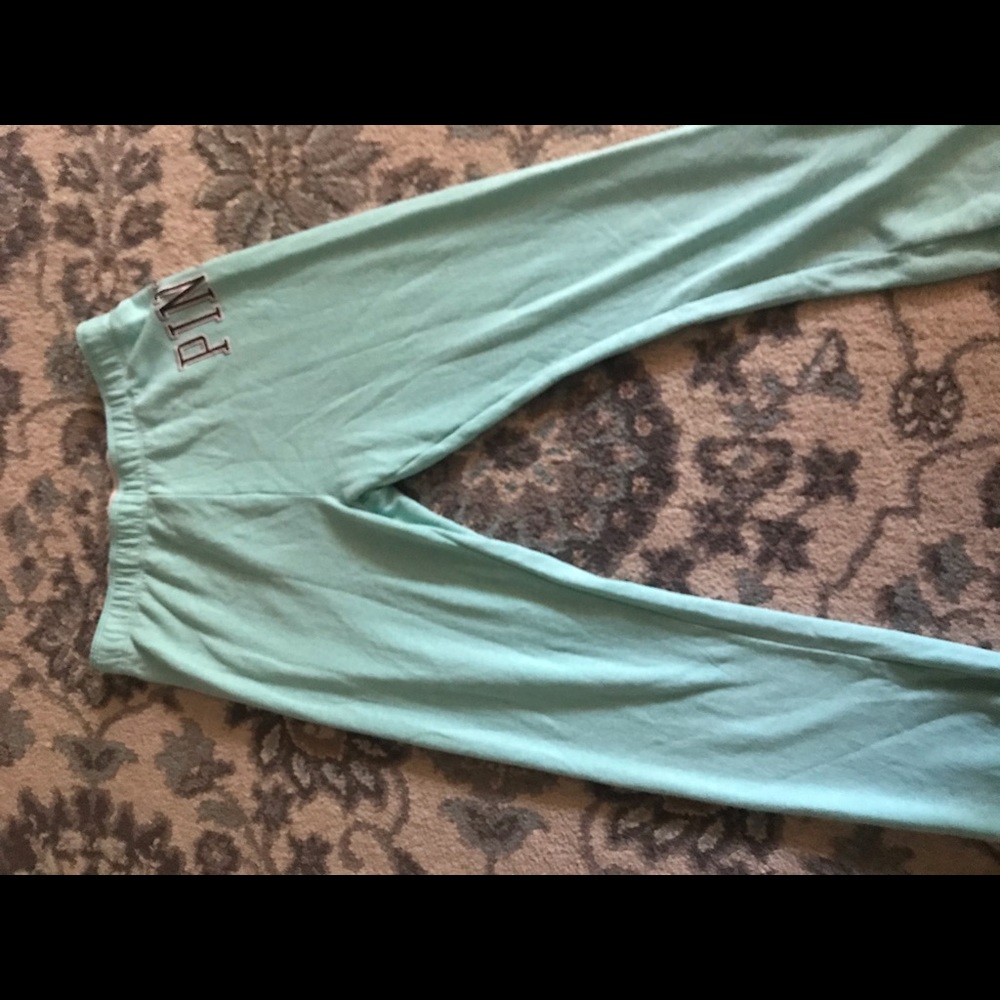 teal(?) pink sweats